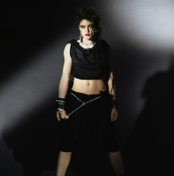 Мадонна в фотосессии Джорджа Хольца для альбома The First Album (1984).